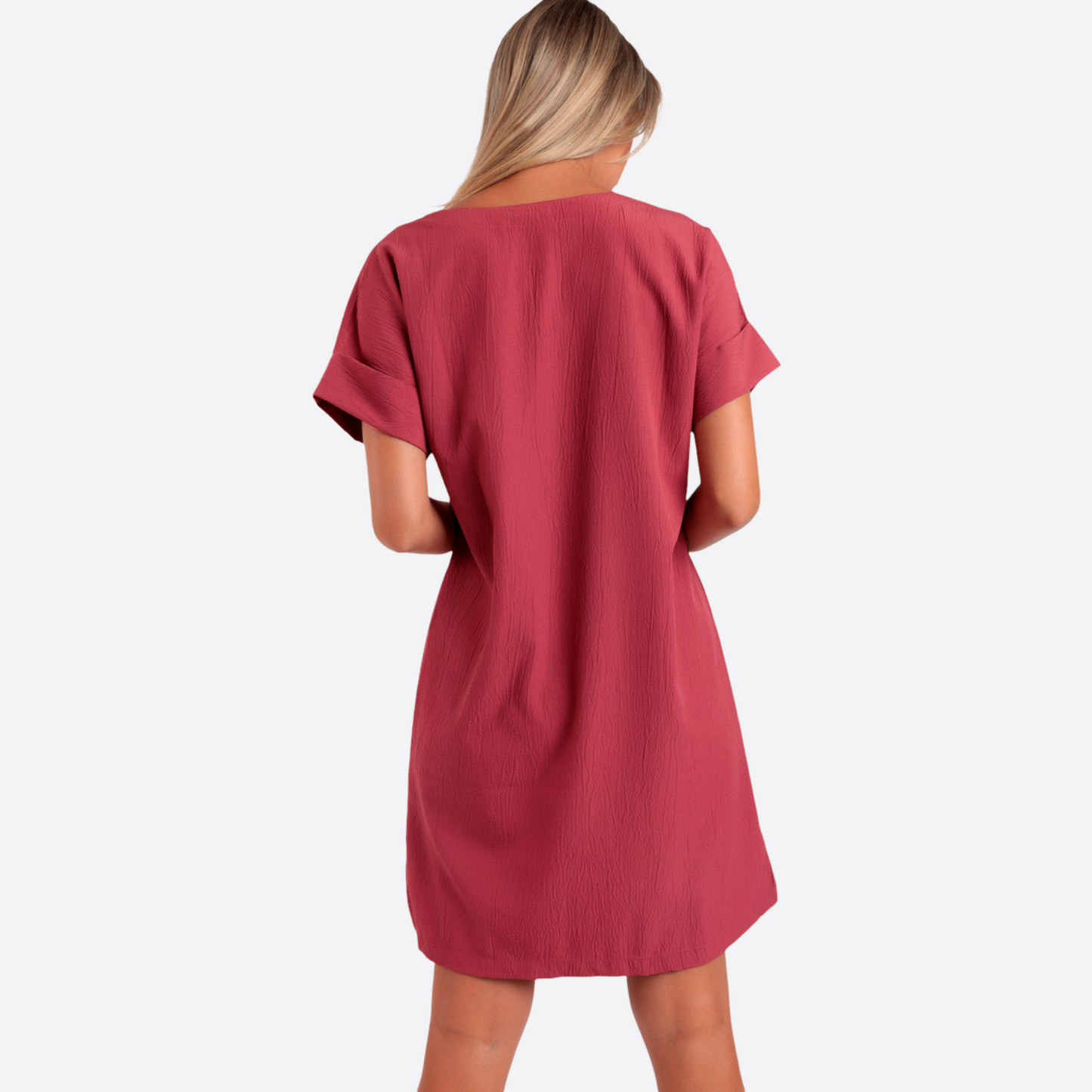 VESTIDO TEXTURIZADO CON BORLAS CARMIN