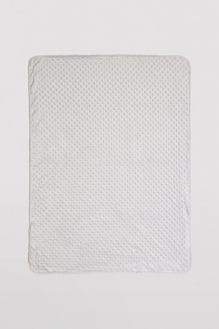 Manta bebé Ysabel Mora topitos marfil 80x110 cm