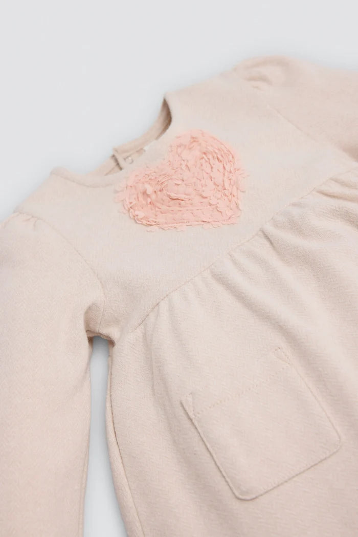 Vestido bebé niña Ysabel Mora beige con corazón texturizado