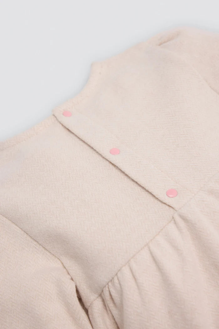 Vestido bebé niña Ysabel Mora beige con corazón texturizado
