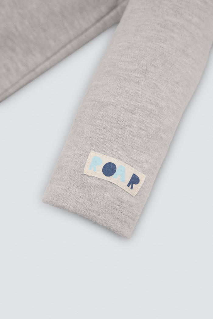 Conjunto de peto bebé marino con camiseta gris y dinosaurio