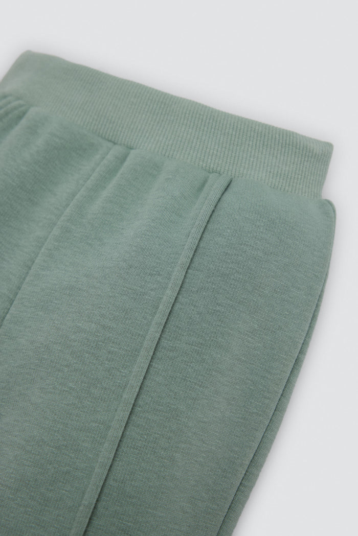 Conjunto de chándal bebé bicolor verde con sudadera Dino Roars