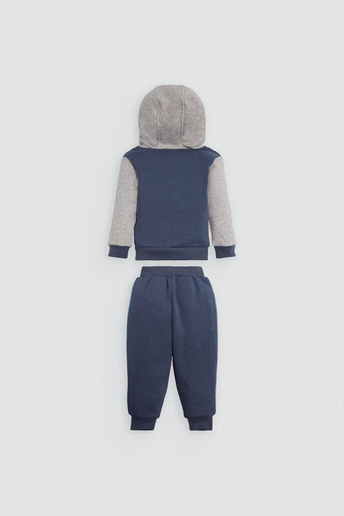 Conjunto de chándal bebé marino con cremallera y dinosaurios