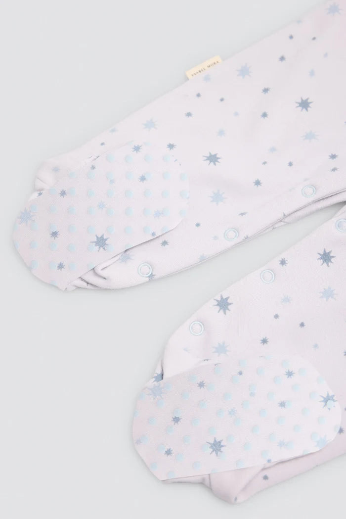 Pelele bebé afelpado blanco con estrellas