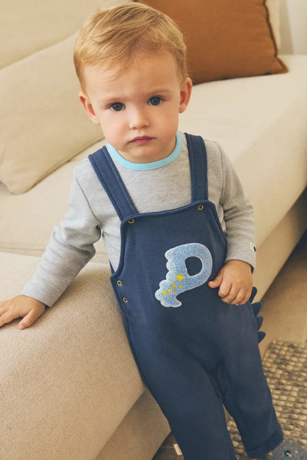 Conjunto de peto bebé marino con camiseta gris y dinosaurio